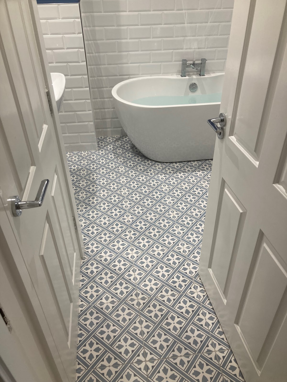 Tiled bathroom wall, Blackpool — L M Tiling